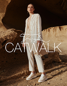 Woman with catwalk sneaker in the desert