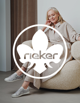 Woman on an armchair with comfort rieker sneaker
