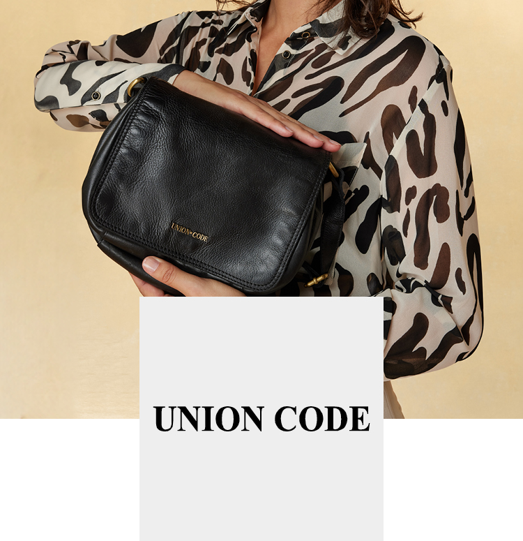 Woman with a leatherbag from Union Code in her hands