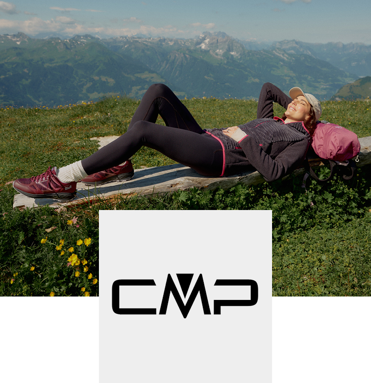 CMP Logo &amp; Frau liegend in den Bergen
