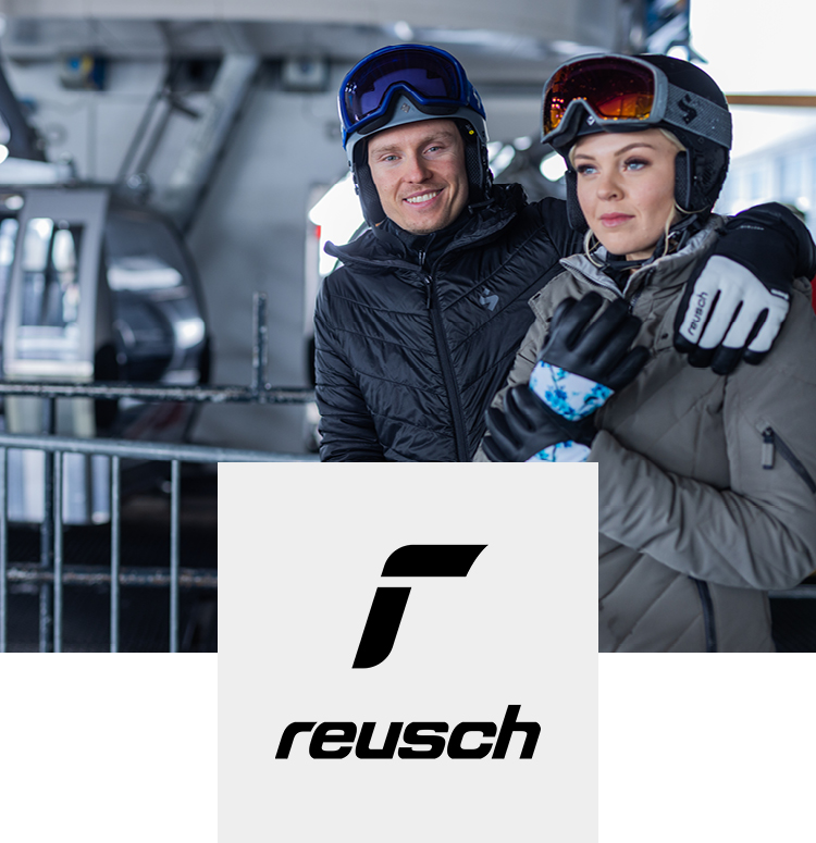 Couple with Reusch gloves at the ski lift