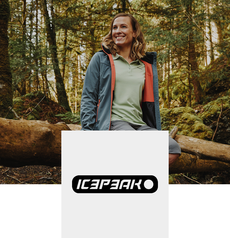 Woman in the woods with icepeak clothes