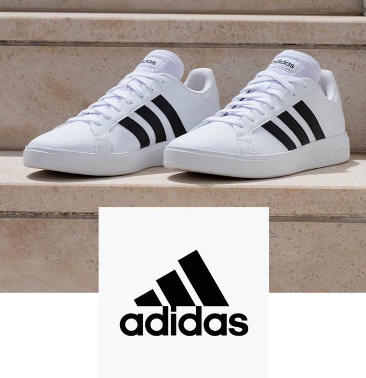 Adidas Sneaker auf Treppe
