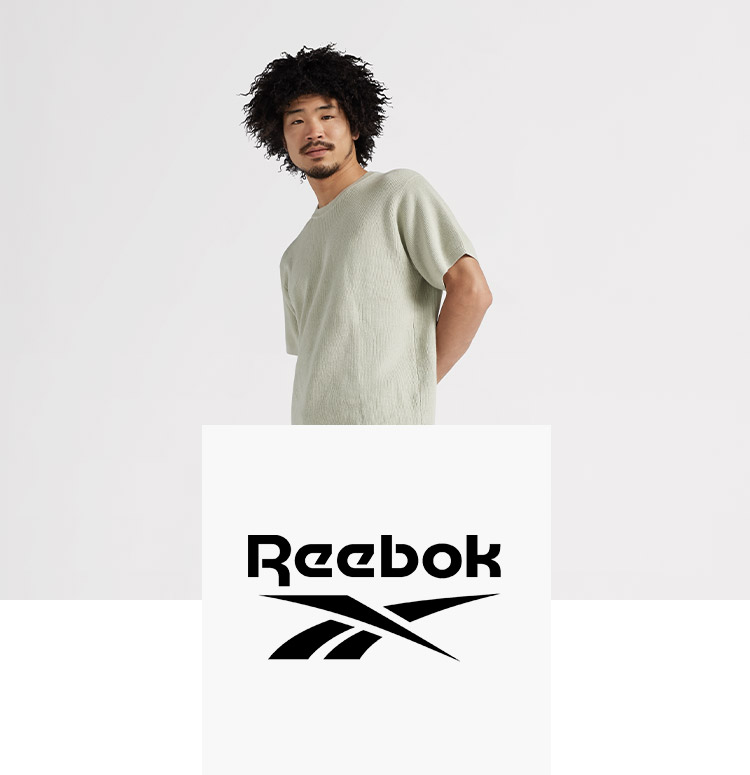 Man and Reebok logo