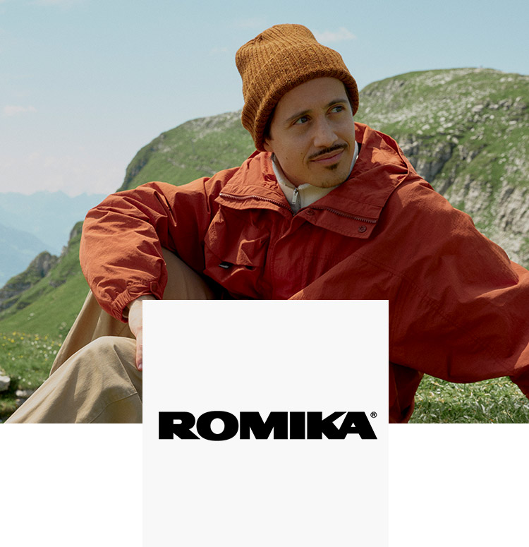 Mann in den Bergen &amp; Romika Logo