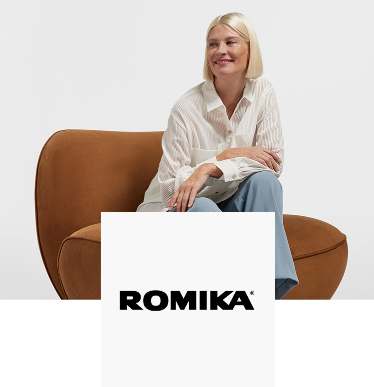 Woman on an armchair with Romika shoes