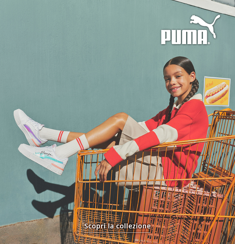 Ragazza con carrello della spesa e scarpe da ginnastica Puma