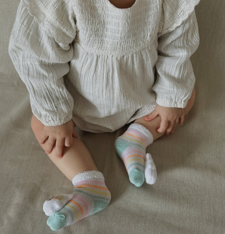 Baby feet with skechers rattle baby socks