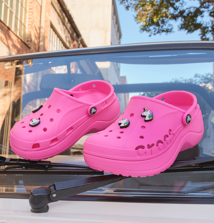Pink Crocs on a car